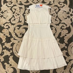 Carlucci size 6 white ruffle dress